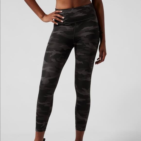 NWOT Athleta Ultimate Stash Pocket Camo 7/8 Tight in Black Camo.